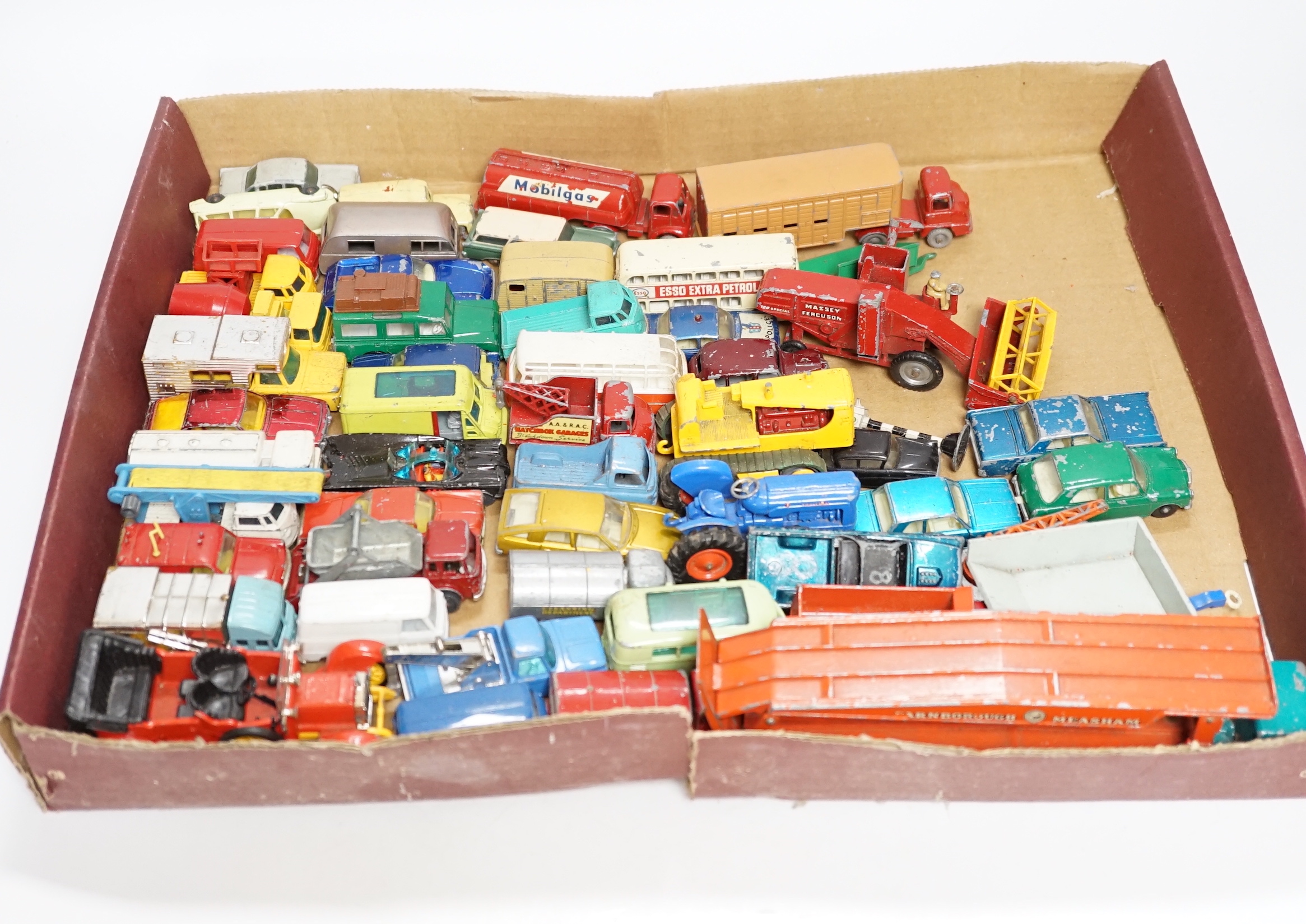 A collection of diecast vehicles by Corgi Toys, Dinky, Spot-On, Matchbox, etc. including 38, corgi toys; a Batmobile, a gold James Bond Aston Martin, a Man From UNCLE Oldsmobile, etc. 18 Husky Toys, ten Dinky Toys, etc.